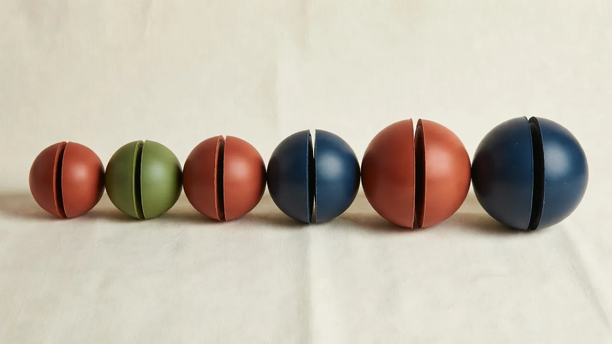 Rubber dog balls hardness and diameter comparison flatlay for wholesale RFQ specs